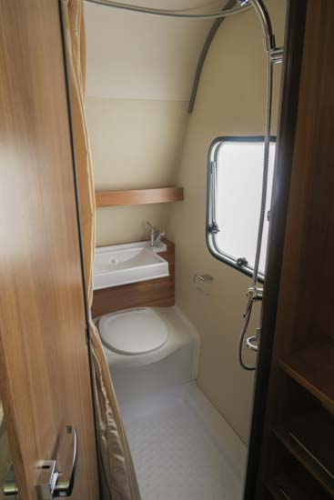 Toiletrum med klapvask